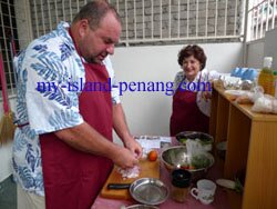 Cairns Ian and Lillian cooking in Penang