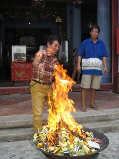 Burning of Joss paper during Cheng Beng in Sungai Bakap
