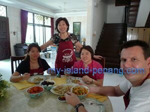 Pheng, Ching and Josh eating in Penang Homecooks