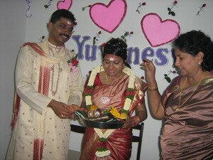 Receiving gifts from aunt in Malaysian Indian Engagement