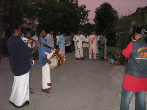 Musician trumpeting during the Malaysian Indian Engagement