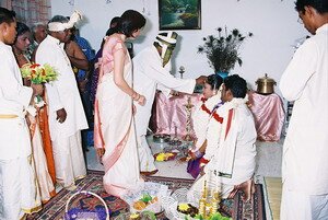 Parents blessing the couple in Malaysian Indian Engagement