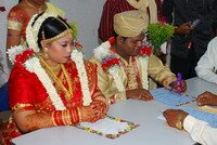 Jivan signing the papers in Hindu Wedding