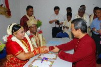 The Sokai Gokai Chief congratulating the newly weds in Indian Wedding