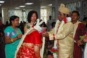 Exchanging flower garland in traditional Wedding