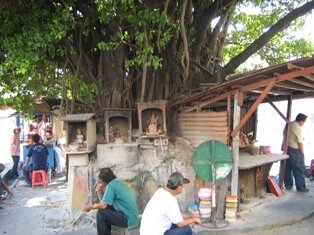 Discarded statue left in front of Goddess of Mercy temple