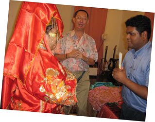 Practising the ceremonial bows in Baba and Nyonya Wedding