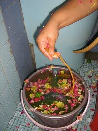 Turmeric and Flower Bath during Indian Malaysian Puberty Ceremony