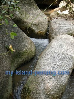 We frolic in between rocks and boulders