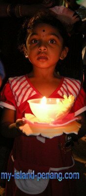 A young devotee in Teluk Bahang Floating Procession