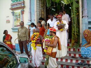 Priest handling over spear ceremony at sri mariamman temple