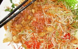 Yee Sang a raw fish salad in Malaysia